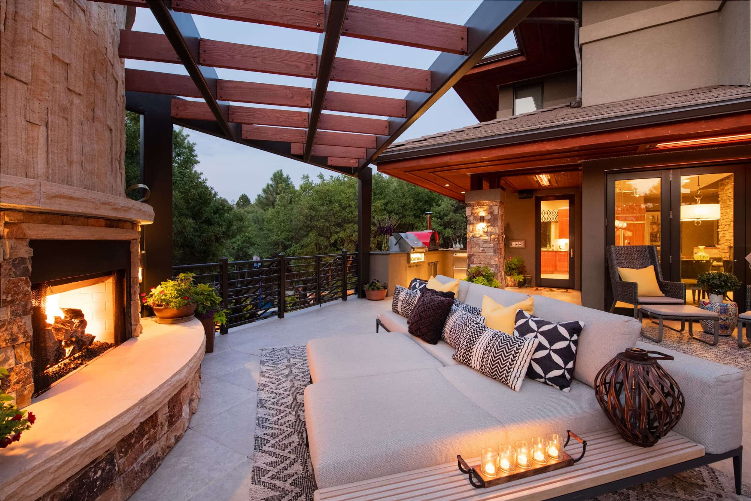 An outdoor living area with a fireplace.