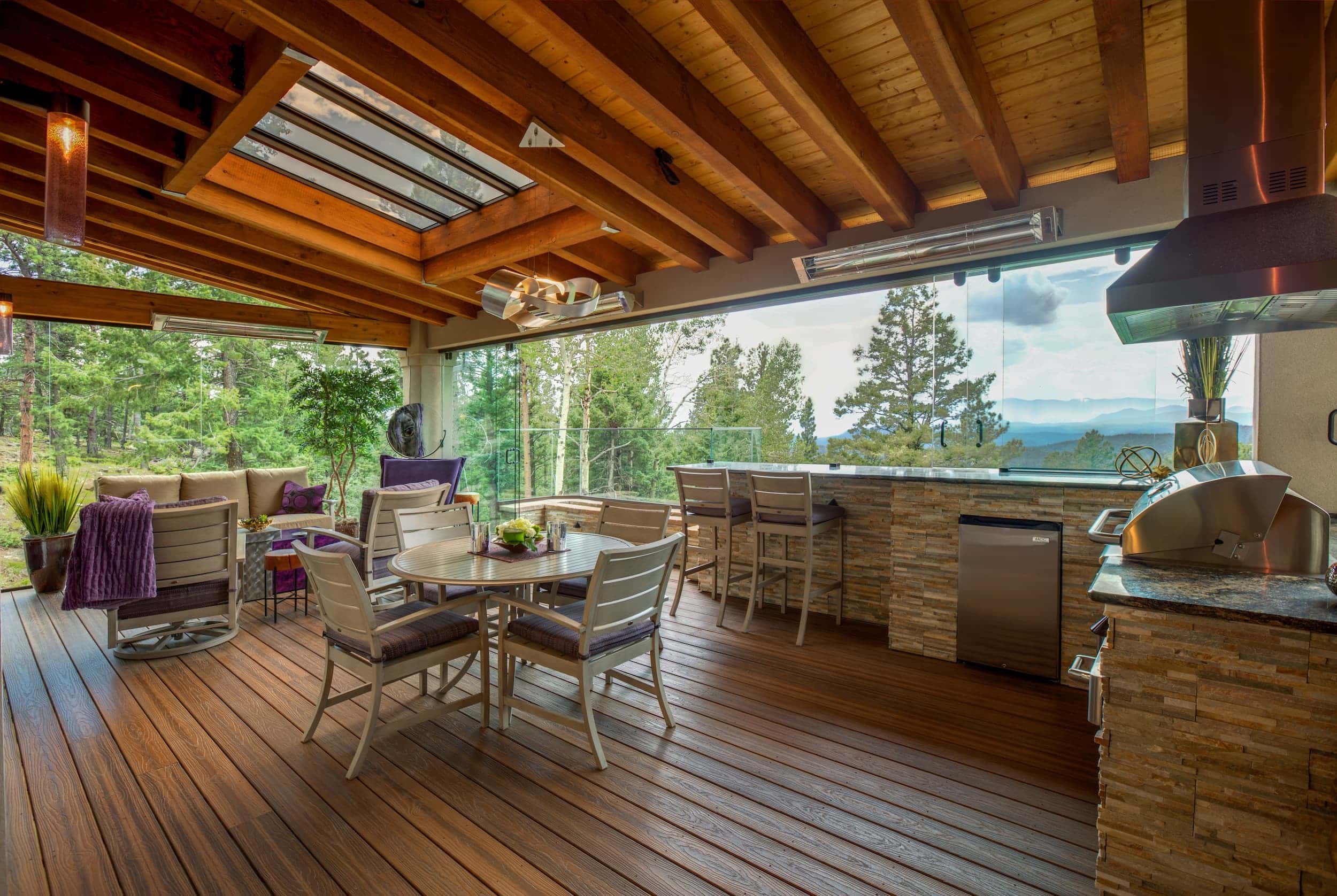 An outdoor kitchen with a view of the mountains.