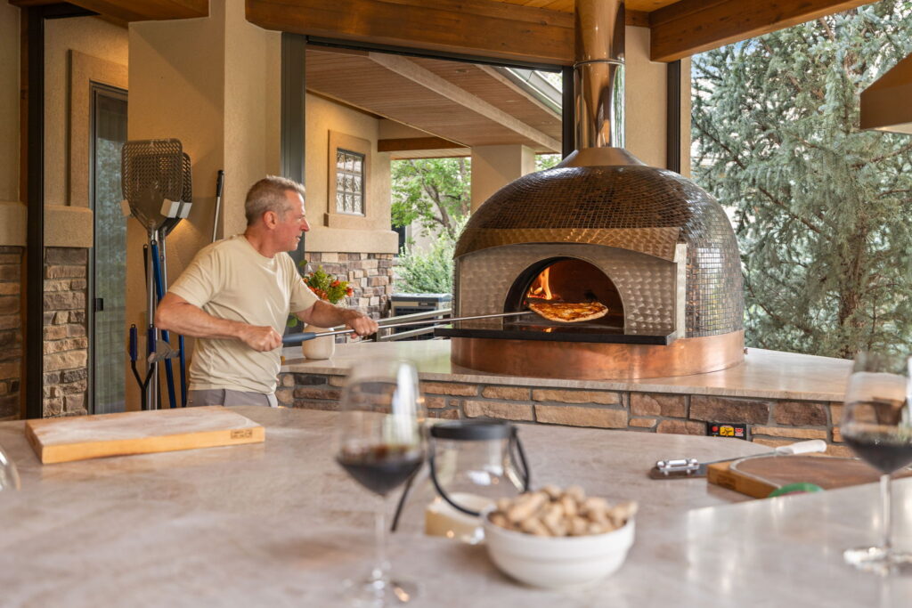 Behold! The deck built around a 3500-pound pizza oven